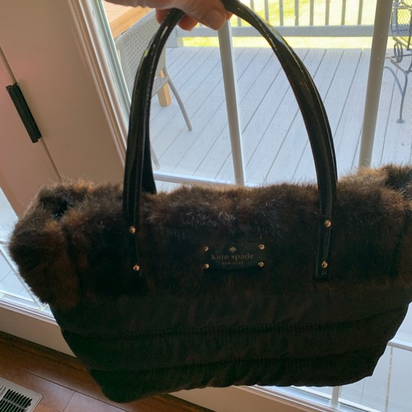 Kate Spade Black fabric handbag with brown fur top